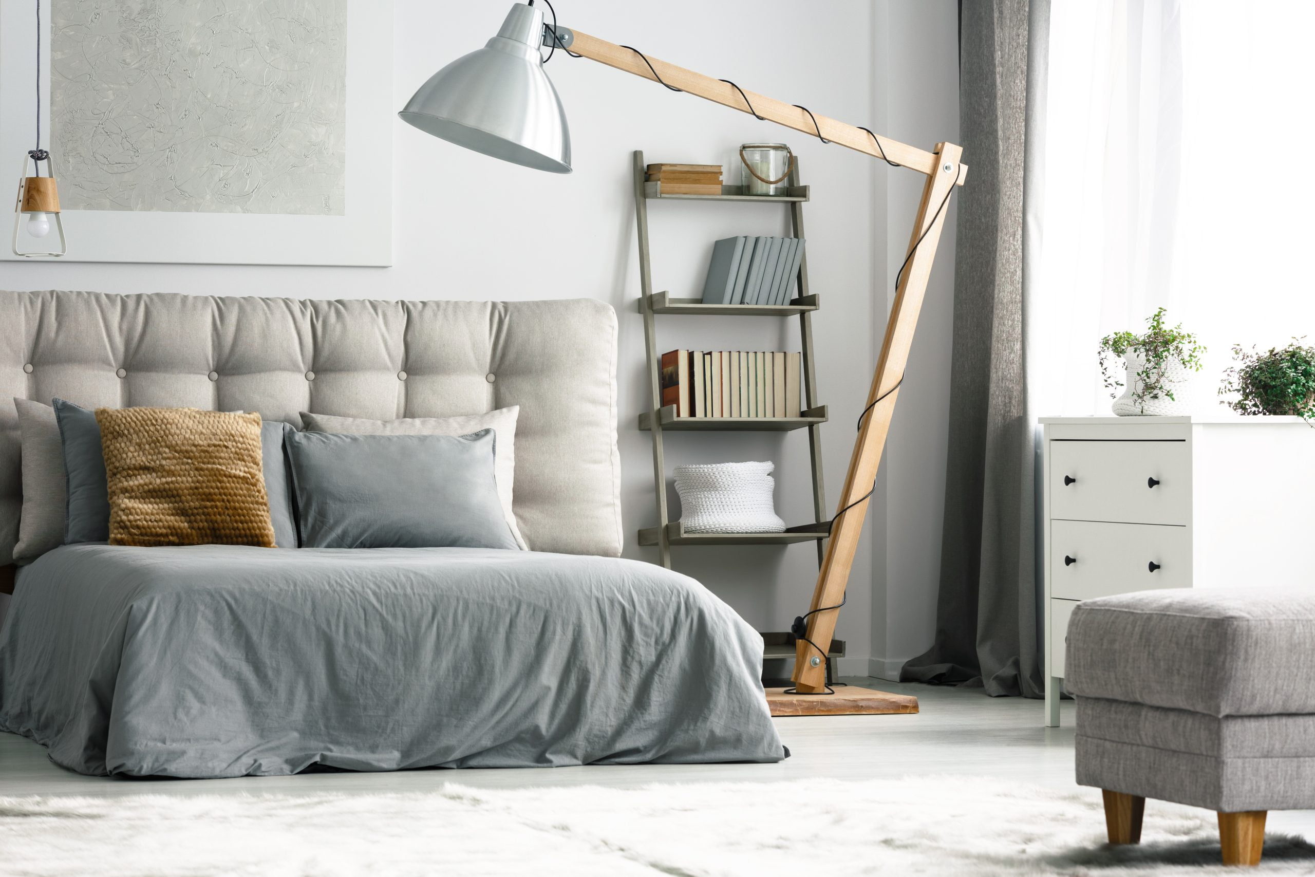 Wooden decor in grey bedroom